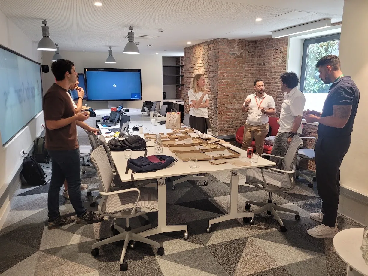 The Prominence AI team around a meeting table during a working session